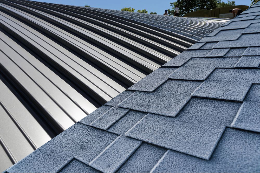 Combining asphalt shingles with metal roof