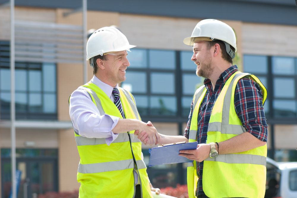 Man asking a Miami Roofing contractor questions before hiring